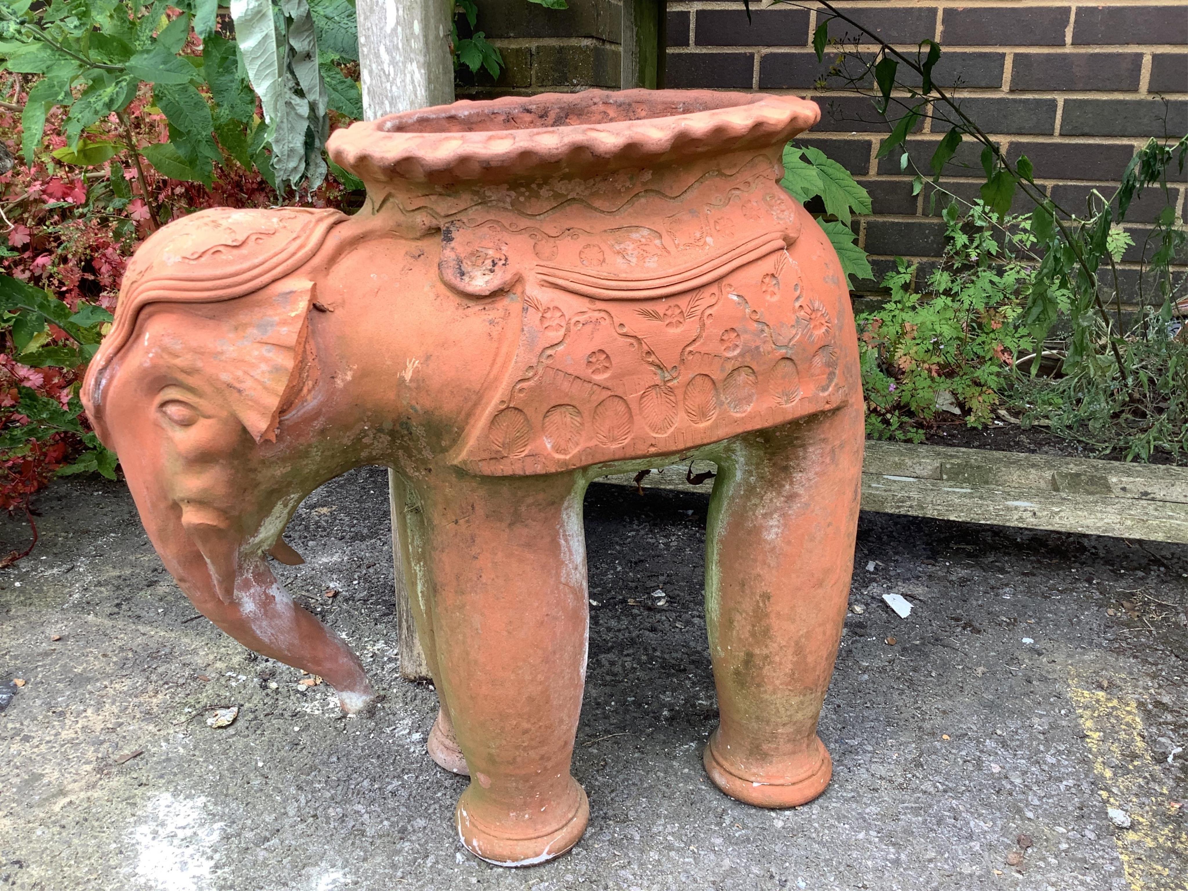 Assorted terracotta garden planters, largest height 52cm and an elephant planter. Condition - mainly good